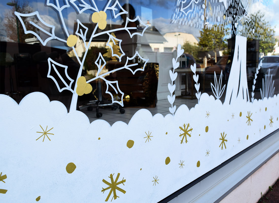 peinture d'artiste pour la création d'une vitrine de Noël originale